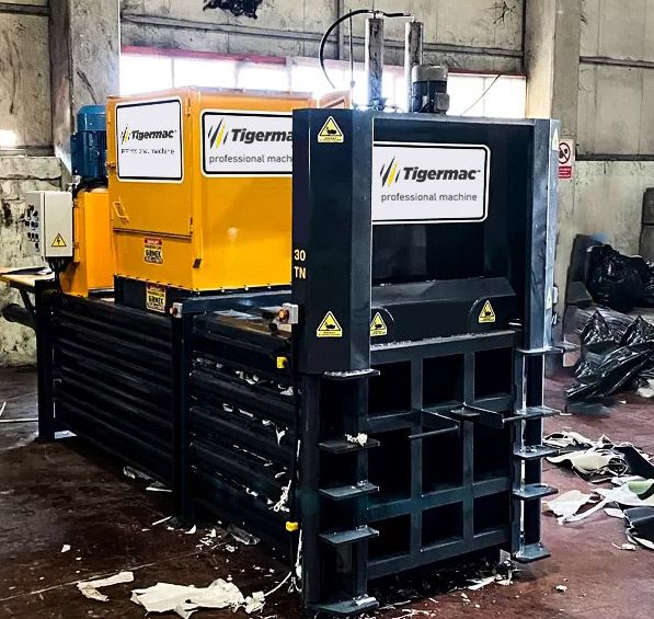 Tigermac vertical baler press installed beside a horizontal press